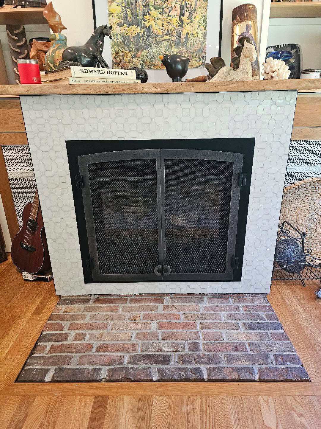 Fireplace surround in white hex mosaic tile